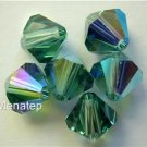 8 4mm Swarovski 5301 Crystal Bicones -- Erinite AB