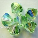 8 4mm Swarovski 5301 Crystal Bicones -- Chrisolite AB