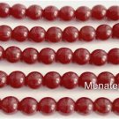 50 6mm Czech Glass Round Beads: Hurricane Glass - Oxblood Coral