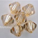 8 4mm Swarovski 5301 Crystal Bicones -- Golden Shadow