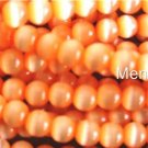 50 6mm Fiber Optic Cats Eye Beads -- Orange