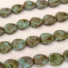 25 12 x 9 mm Czech Glass Twisted Flat Oval Beads: Opaque Light Blue - Picasso