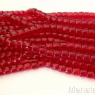 25 7 x 9 mm Czech Glass Druk Roller Beads: Light Siam
