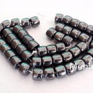 25 7 x 9 mm Czech Glass Druk Roller Beads: Gunmetal