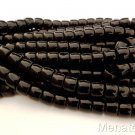 25 7 x 9 mm Czech Glass Druk Roller Beads: Jet