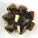 5 5mm Swarovski 5301 Crystal Bicones -- Dorado 2x(Please Read Item Description)