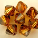 5 6 mm Swarovski 5301 Crystal Bicones -- Topaz Satin
