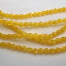 50 4 mm Czech Glass Firepolish Beads: Milky Yellow
