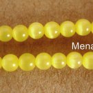60 4 mm Fiber Optic Cats Eye Beads: Yellow