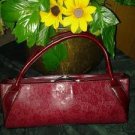 Rina. Rich  handbag 100%leather bag. V pretty purse
