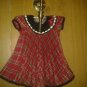 Young land 4 kids. V cute dress size 12. Months.