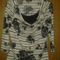 Brittany. Black.spandex blouse V pretty top with sparkle. 4 women