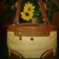 Etienne. Aigner . Pretty purse 4. Woman.