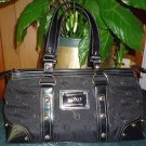 BLACK XOXO HANDBAG IN GREAT CONDITION VERY CLASSY YOU WILL LOVE IT