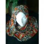 this. Scarf can be worn as shown in one pic or as in ather picture two way