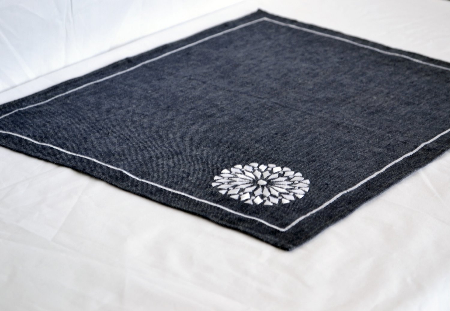 Placemats in navy blue gray with white embroidered medallion Linen