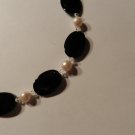 Fresh water pearls with Clear crystals, and black beads