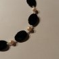 Fresh water pearls with Clear crystals, and black beads