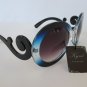 Oversized Round Designer Style Women Sunglasses with Swirl Frames and Dark Lens