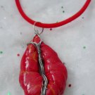''Sealed Lips'' Pendant