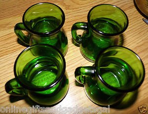 4 ANTIQUE SMALL GREEN GLASS JARS - STAMPED WTIH DUAL STAGS