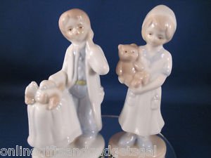 LITTLE GIRL AND LITTLE BOY FIGURES