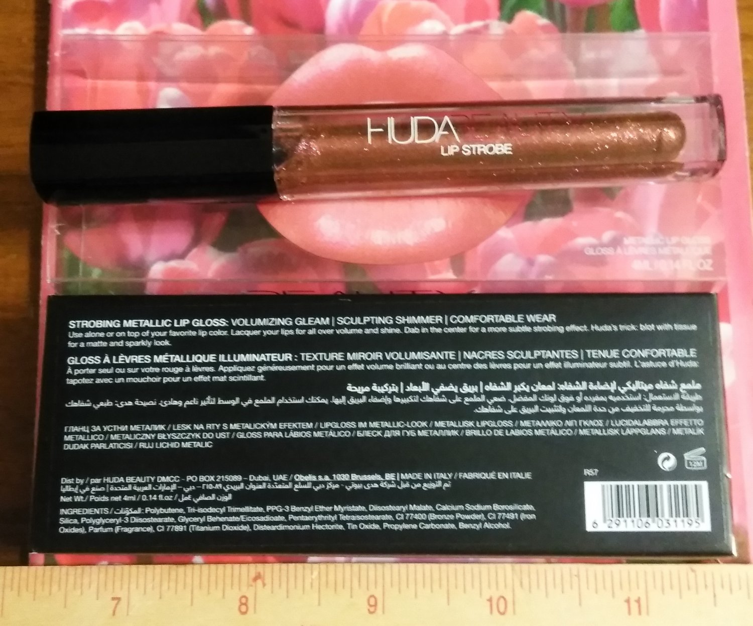 Huda Beauty Lip Strobe Lipgloss SHAMELESS (sheer base with gold pink