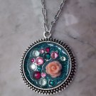 Teal glittery pendant necklace round silvertone rose Swarovski crystal sparkly resin