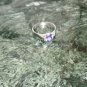 STAINLESS STEEL SOLITAIRE RING WITH PURPLE CRYSTAL