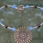 Single strand necklace with vintage copper pendant