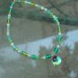 Blue and green beaded necklace with pendant