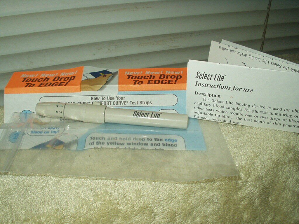 vintage select lite lancing device for universal lancets w/ instructions