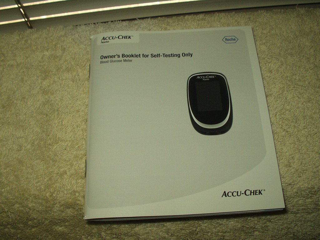 Accu-chek nano glucose meter/monitor manual only in english & spanish