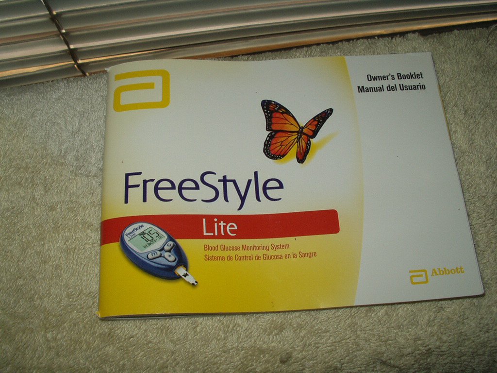freestyle lite glucose monitoring system manual only in english & spanish