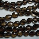 14 Inches Top Quality Smokey Quartz Faceted Oval Shape Beads Size 10 To 12MM