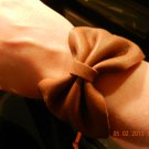 Leather bow cuff