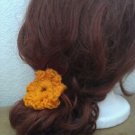 Orange flower hair tie