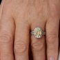 Estate &acirc;��Canary&acirc;�� GIA 3.23ct Natural Fancy YELLOW VS1 Oval Diamond 18K Halo Ring