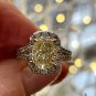 Estate &acirc;��Canary&acirc;�� GIA 3.23ct Natural Fancy YELLOW VS1 Oval Diamond 18K Halo Ring