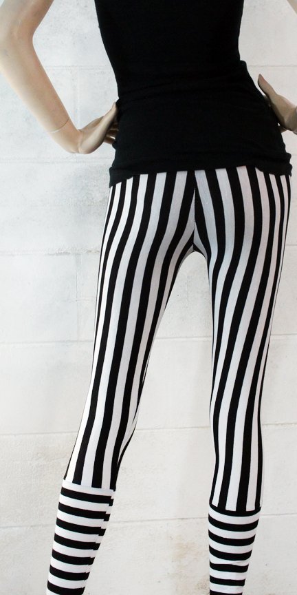 black leggings with white stripe down the side outfit