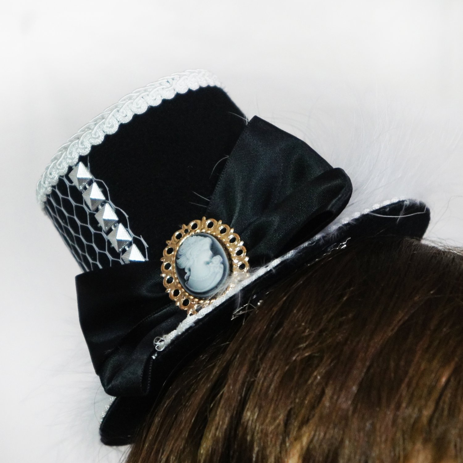Black and White ClipOn Top Hat with Cameo, Feathers, and Net (lw106)