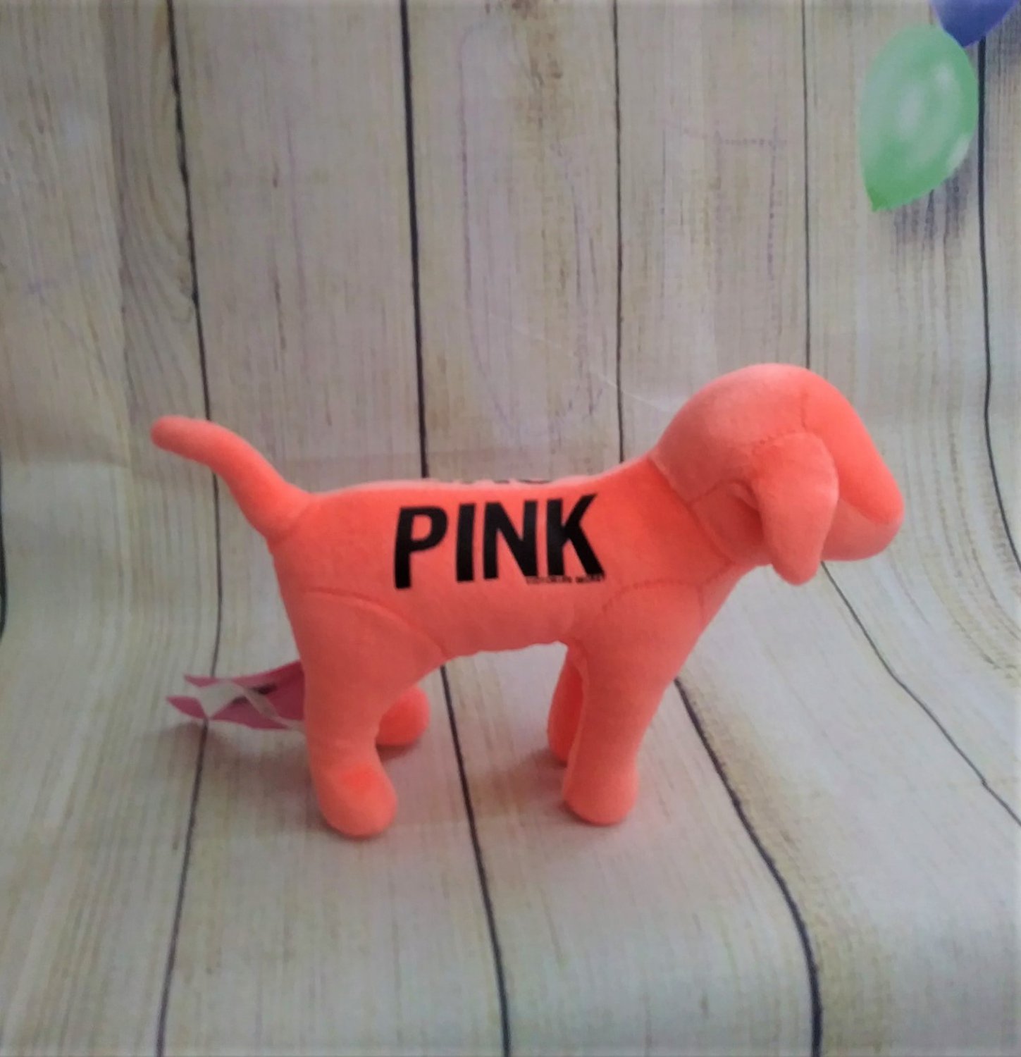 giant pink stuffed dog