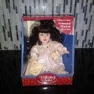 Dan Dee Collector's Choice - Musical Fine Porcelain Doll with Cream-Gold Dress and Black Hair