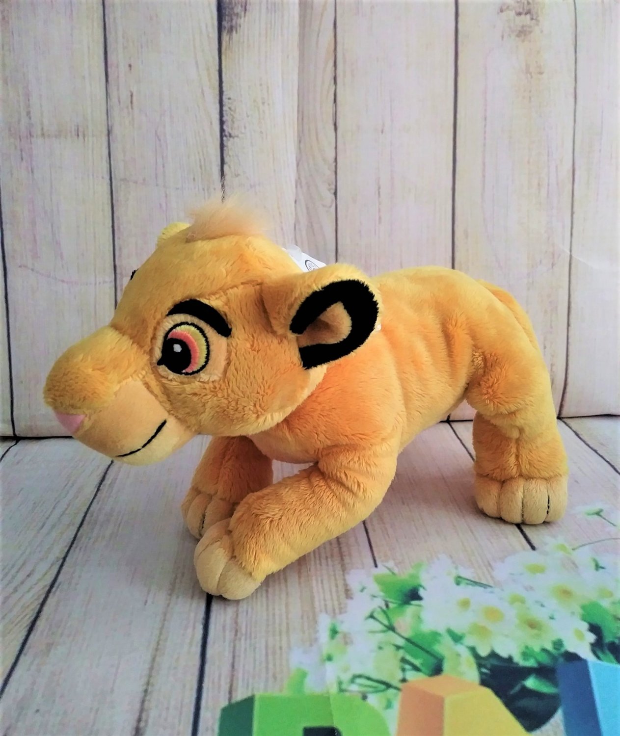 simba plush in pouch