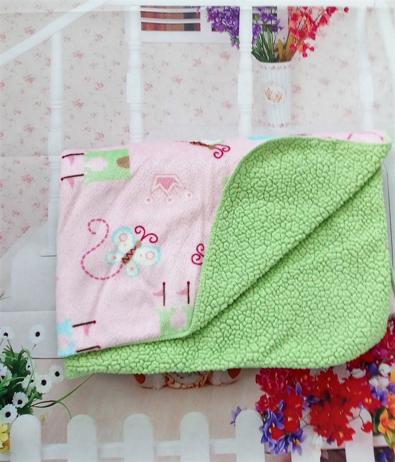 Just Born - Pink Blanket with Castles, Crowns and Butterflies Design. Green Sherpa