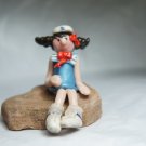 silor girl on flagstone