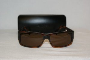 B. New Calvin Klein Brown Sunglasses: Mod. 829 & Case
