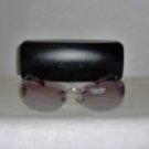 B. New Calvin Klein Silver Sunglasses: Mod. 415S & Case