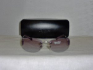 B. New Calvin Klein Silver Sunglasses: Mod. 415S & Case