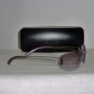 B. New Calvin Klein Silver Sunglasses: Mod. 415S & Case